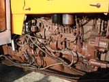 a close up of a truck engine with wires attached to it
