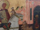 painting of a man riding a horse in front of a castle