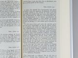 an open book that is sitting on a table