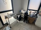 an image of a room with a desk and a window