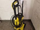 a yellow and black pressurer on the floor in a room