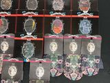 a lot of bracelets on display on a black table
