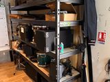 a room that has a bunch of shelves in it