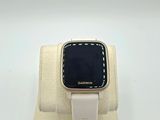 an image of a smart watch sitting on top of a white stand