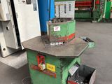a machine that is sitting on the ground in a factory