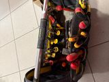 a tool bag with tools in it on the floor