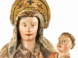 an image of a statue of a woman holding a child