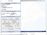 a close up of a document with a picture of a person on it