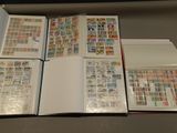 a lot of stamps in a book on a table