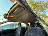 the interior of a car with the sunroof down and the sunroof down