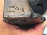 a person holding a metal object in their hand