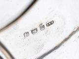 an antique silver plate with the word gourmet written on it