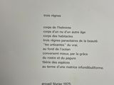 a white sheet with a poem written in french on it