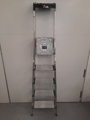 a ladder that is leaning up against the wall