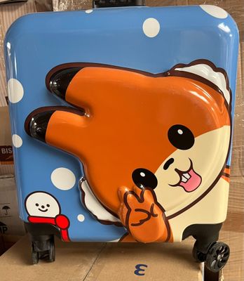 une valise sur laquelle est représenté un chien