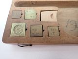 a close up of an old wooden calculator