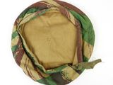 a close up of a hat with a camouflage pattern on it