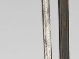 two different types of swords that are on display