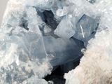 a large piece of ice that is sitting on top of a rock