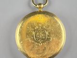 an image of a gold pocket watch on a white background