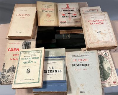 a lot of old books on a table together