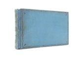 a blue book that is sitting on a white surface