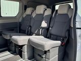 four seats in the back of a van with the door open