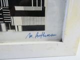 a black and white picture of a building with a blue marker on it