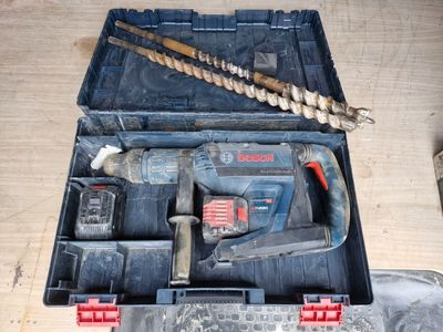 a tool in a toolbox on a wooden floor