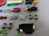 a lot of toy cars that are on the table