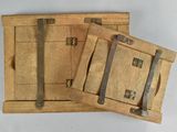 two pieces of wood with metal handles on them