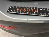 a close up of a sticker on the back of a car