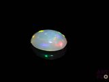 an image of a white oplite on a black background