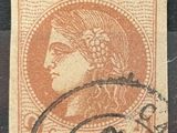 un timbre sur lequel figure l'image d'une femme