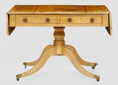 une image représentant une petite table en bois à deux tiroirs montée sur roulettes