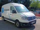 a white van that is parked in a parking lot