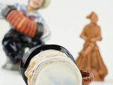 three figurines that are sitting next to each other