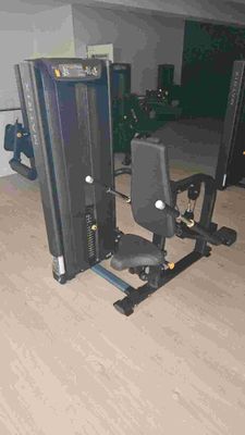 an image of a gym room with equipment in it