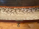 a wooden bench with a floral design on it