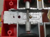 a close up of a toy truck with a clock on it ' s side