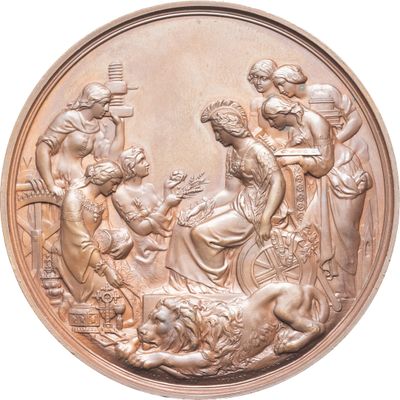 une image d'une médaille en bronze représentant une scène de la naissance de Jésus