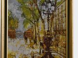 framed oil painting of a street scene with a fountain and street lights