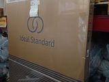 a large cardboard box sitting on top of a pallet in a warehouse