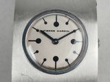 an image of a close up of a wrist watch on a white surface