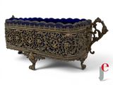 an ornate blue and gold box with handles and handles