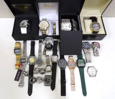 a lot of watches that are sitting in a box