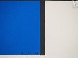 a painting of a blue and black square on a white wall
