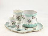 a picture of a tea set on a white background