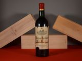 a bottle of wine that is sitting on a table