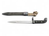 two different types of knives on a white surface